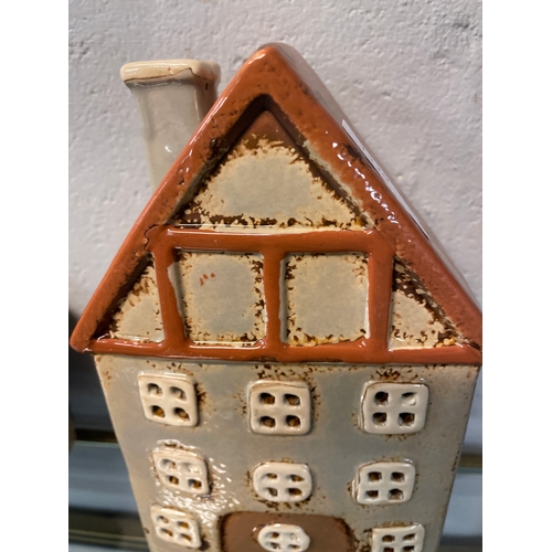 1329 - A ceramic tealight cottage, H 22cms (566007)   #