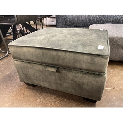 1444 - A green velvet upholstered ottoman footstool