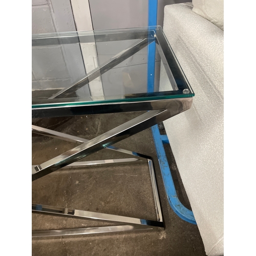 1455 - A glass and chrome 'X' base console table * this lot is subject to VAT