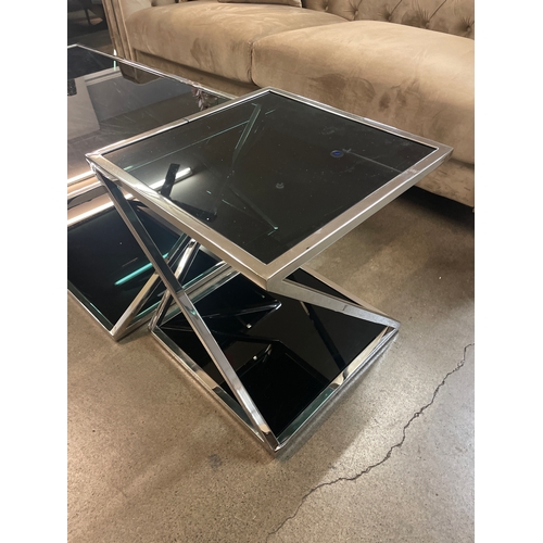 1374 - A black glass and chrome coffee table and lamp table * this lot is subject to VAT