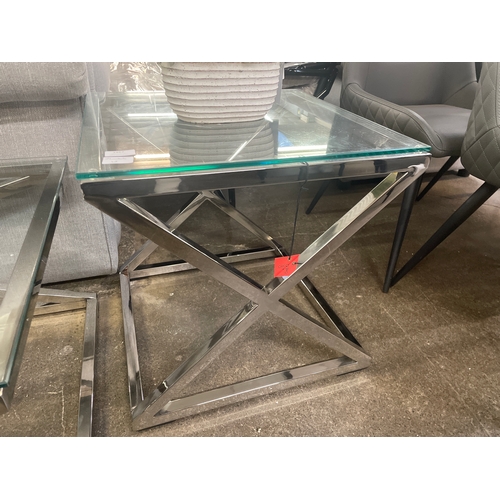 1467 - A glass and chrome 'X' base lamp table * this lot is subject to VAT