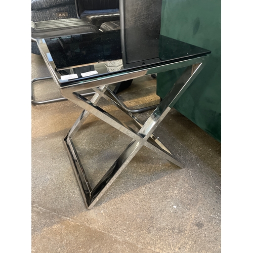 1471 - A black glass and chrome 'X' base lamp table * this lot is subject to VAT