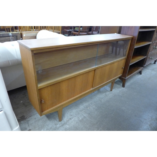 33 - A teak bookcase