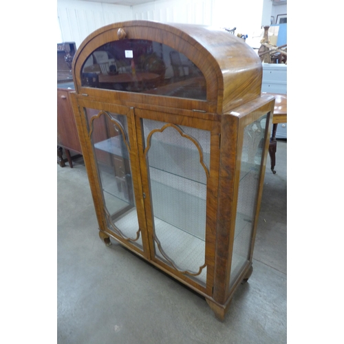 74 - An Art Deco walnut display cabinet