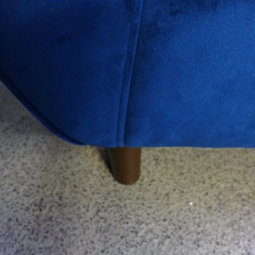 1517 - A Hoxton blue velvet upholstered three seater sofa