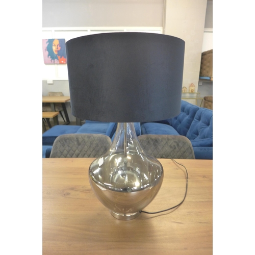 1315 - A silvered glass table lamp with choice of shades, navy and silver