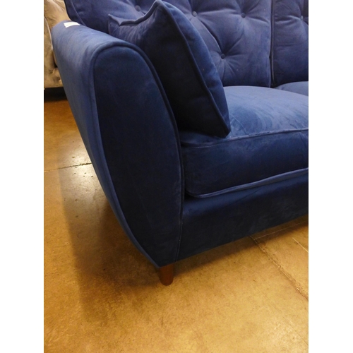 1320 - A Hoxton blue velvet three seater sofa RRP £799