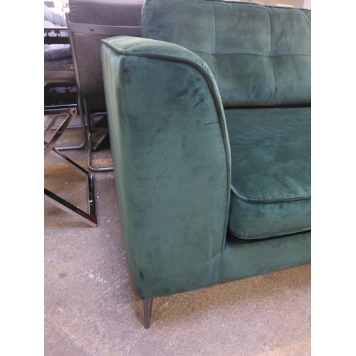 1439 - A deep green velvet upholstered love seat on chrome stiletto legs