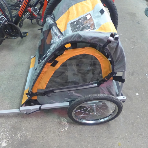 2225 - A bicycle trailer complete with fitting clamp - Police repossession