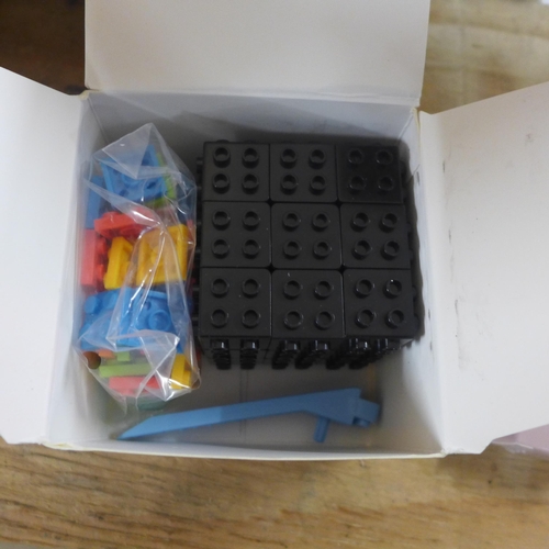 2315 - A box of 3 Lego Rubik's Cubes and 14 xBelamy Care Eyelash Serum