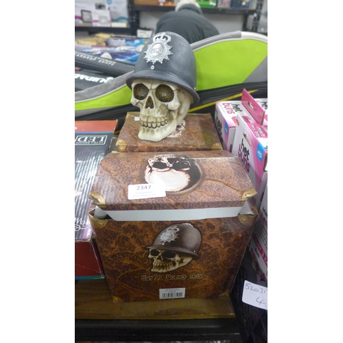 2347 - Two skull money boxes