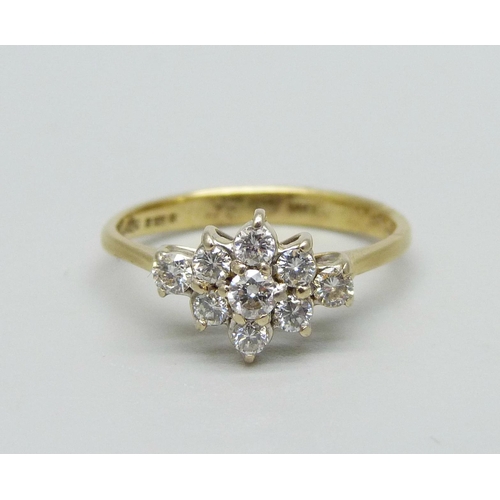 1000 - An 18ct gold, nine stone diamond cluster ring, shank marked 0.35ct, 2.5g, L