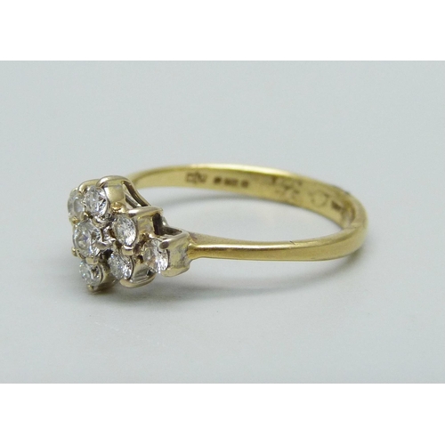 1000 - An 18ct gold, nine stone diamond cluster ring, shank marked 0.35ct, 2.5g, L