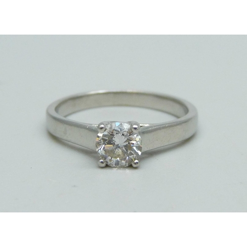 1011 - A platinum ring set with a diamond, 3.8g, K, approximately 0.5ct diamond weight