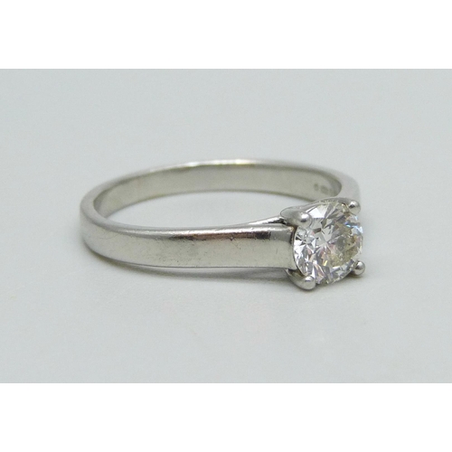 1011 - A platinum ring set with a diamond, 3.8g, K, approximately 0.5ct diamond weight