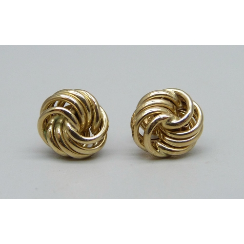 1012 - A pair of yellow metal knot earrings, 1.1g