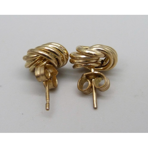 1012 - A pair of yellow metal knot earrings, 1.1g