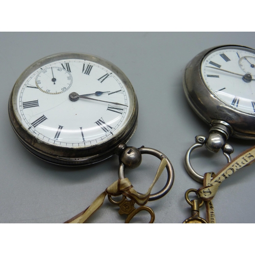 1021 - A silver pair cased pocket watch, Chester 1890, and a silver cased Waltham pocket watch