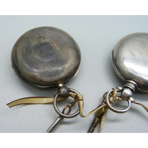 1021 - A silver pair cased pocket watch, Chester 1890, and a silver cased Waltham pocket watch