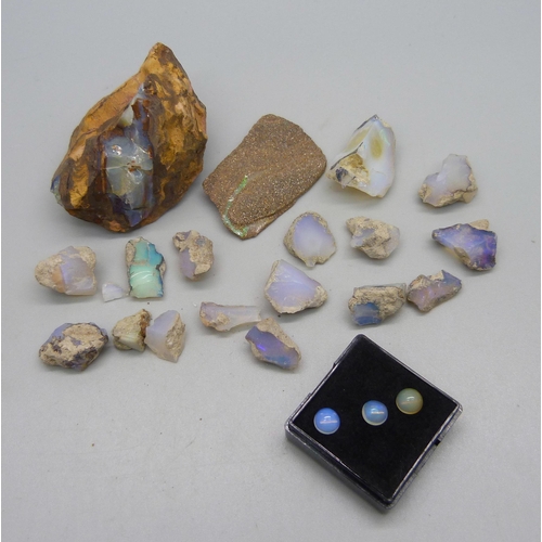 1031 - A collection of opals, rough and boulder, weight 92g, 465 carats approximately