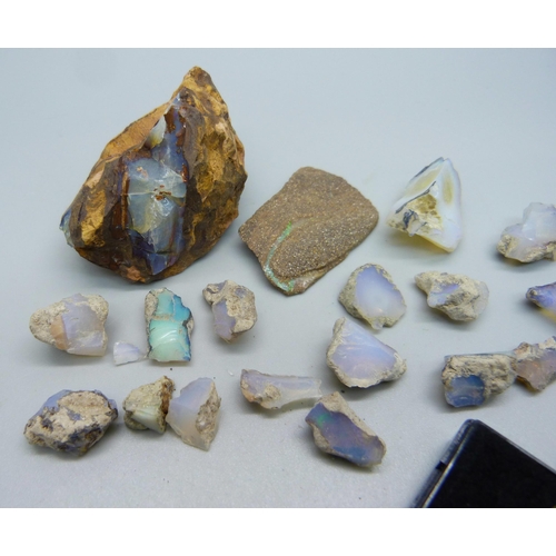 1031 - A collection of opals, rough and boulder, weight 92g, 465 carats approximately