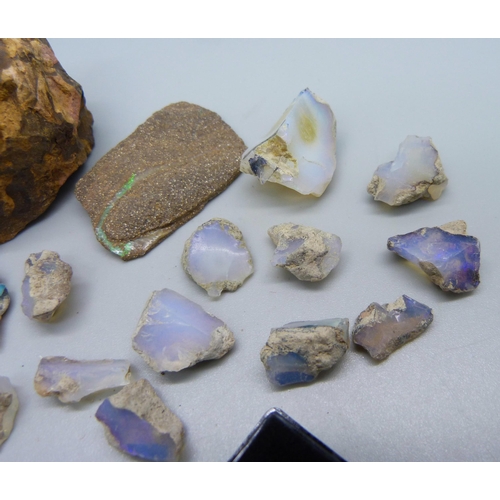 1031 - A collection of opals, rough and boulder, weight 92g, 465 carats approximately