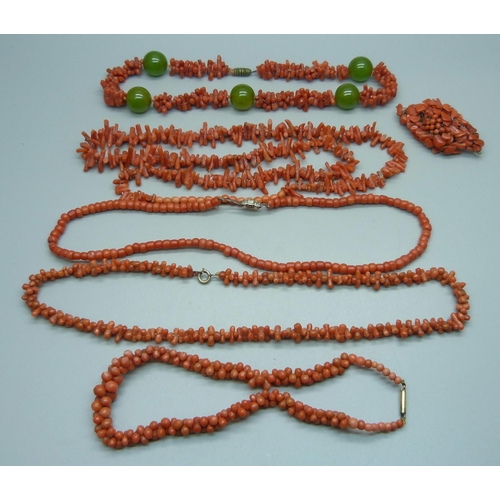 1047 - Five coral necklaces and a brooch