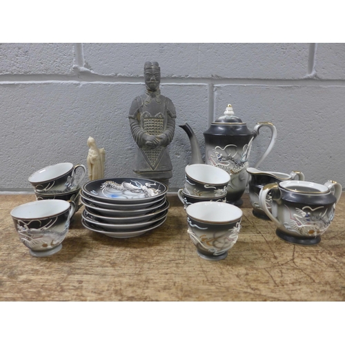 1072 - A Japanese six setting tea set, sugar pot lacking lid, a Chinese terracotta warrior and a soapstone ... 