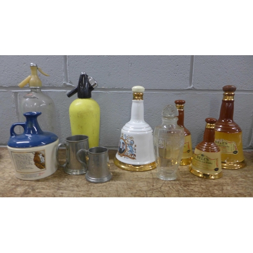 1079 - A soda syphon, Bell's Whisky decanters, etc. **PLEASE NOTE THIS LOT IS NOT ELIGIBLE FOR POSTING AND ... 