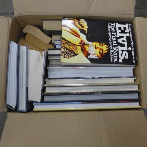 1114 - Elvis Presley hardback and paperback books, a box of memorabilia including mirror, scrap books, maga... 