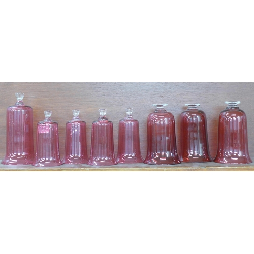 611 - Eight cranberry glass bell top domes **PLEASE NOTE THIS LOT IS NOT ELIGIBLE FOR POSTING AND PACKING*... 