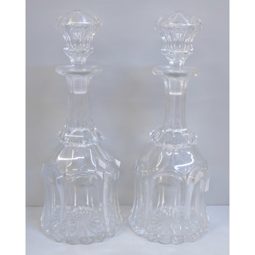 612 - A pair of Georgian mallet shaped glass decanters