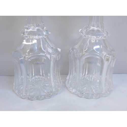 612 - A pair of Georgian mallet shaped glass decanters