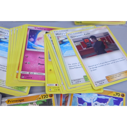 621 - Over 500 assorted Pokemon cards in ETB box, some shiny cards