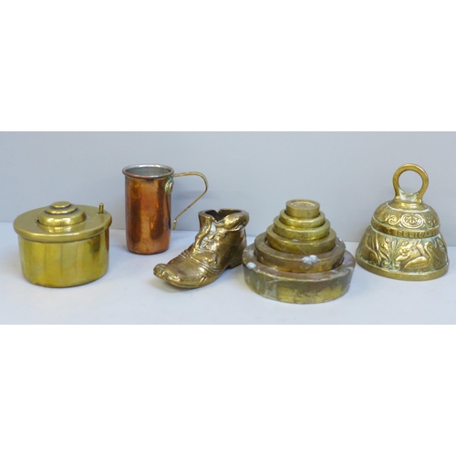 628 - A copper stirrup cup, brass weights and other brass items