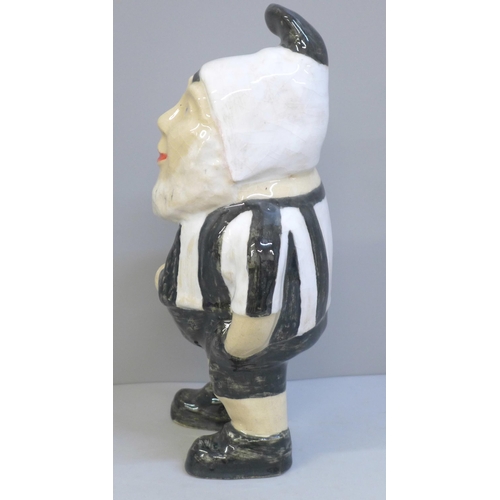 629 - A glazed pottery garden gnome, light crazing, 25cm