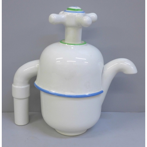 633 - A novelty Carlton Ware teapot in the form of a tap, small hairline crack to handle