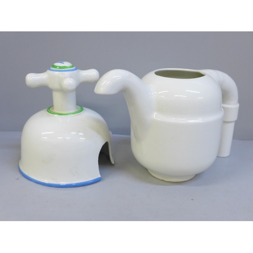 633 - A novelty Carlton Ware teapot in the form of a tap, small hairline crack to handle