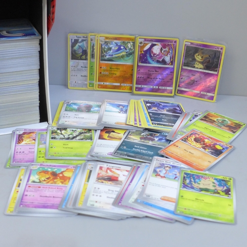 637 - Over 500 assorted Pokemon cards in ETB box, some shiny cards