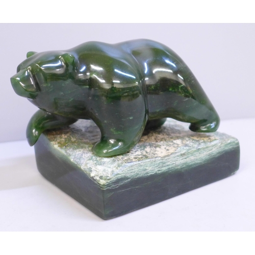 651 - A jade model of a bear, on stand