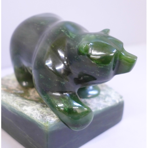 651 - A jade model of a bear, on stand