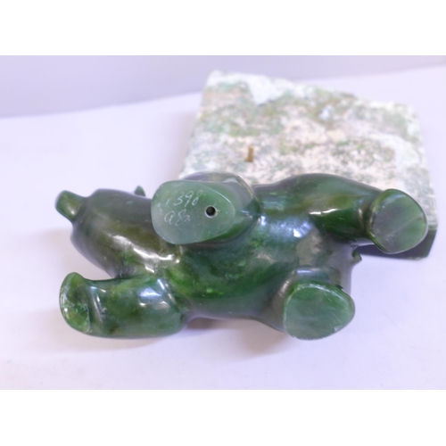 651 - A jade model of a bear, on stand