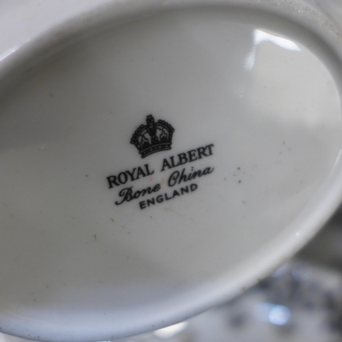 664 - A collection of Royal Albert Anniversary china; 50th Anniversary six rectangular dishes, two oval di... 