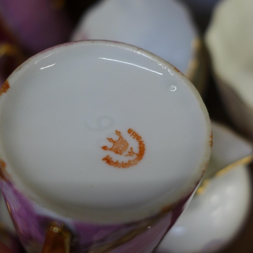 672 - A Czech pink lustre six setting coffee set, lacking one cup, five Aynsley tea cups, milk jug and sug... 