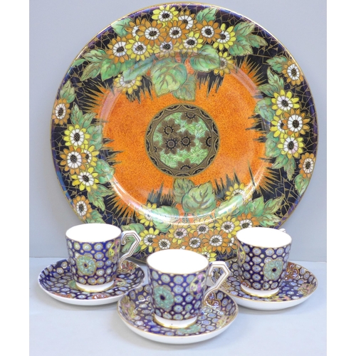 690 - Three Crown Derby coffee cups and saucers, one cup, a/f and a Maling Daisy lustre plate