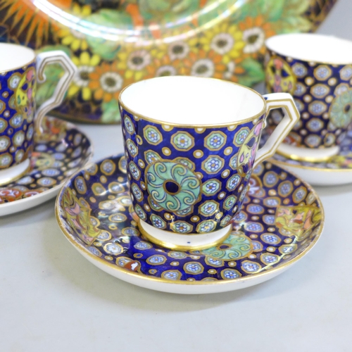 690 - Three Crown Derby coffee cups and saucers, one cup, a/f and a Maling Daisy lustre plate