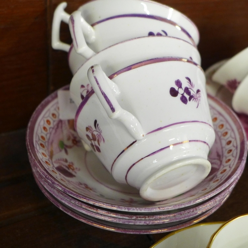 695 - Four Victorian pink lustre cups and saucers, a similar cream jug, two other Victorian cups and sauce... 