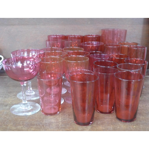 696 - A collection of cranberry glass wines and beakers (29) **PLEASE NOTE THIS LOT IS NOT ELIGIBLE FOR PO... 