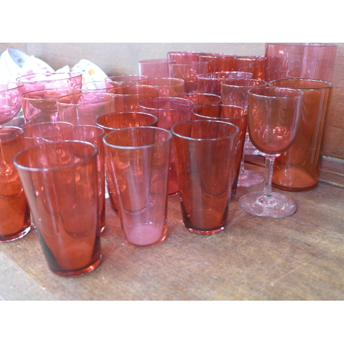 696 - A collection of cranberry glass wines and beakers (29) **PLEASE NOTE THIS LOT IS NOT ELIGIBLE FOR PO... 