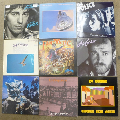 697 - Sixteen 1970s/80s LP records, Bruce Springsteen, Dire Straits, Joe Cocker, etc.